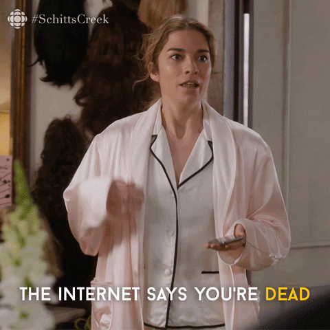 Schitt’s Creek gif. Annie Murphy as Alexis is dressed in her pajamas and holding a phone as she looks ahead concerned. On loop her hand motions with emphasis as she says "The internet says you're dead." which appears in text at the bottom.