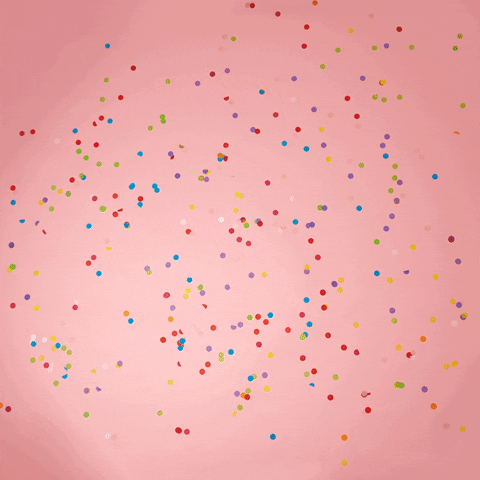 Pohyblivý gif s objevujícím se nápisem "YAY" vytvořeného z nafukovacích zlatých balónků na růžovém pozadí s barevnými konfetami. 
