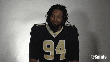 shrugging saints football GIF by New Orleans Saints