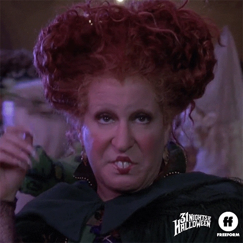 Movie gif. Bette Midler as Winifred from Hocus Pocus gives us a long, bored stare.