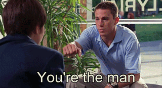 TV gif. Amanda Bynes as Viola dressed as a boy in She’s the Man fist bumps Channing Tatum as Duke. Duke says, “You’re the man.” and Viola says, “Yes I am.”