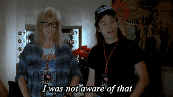 Movie gif. Mike Myers as Wayne in Wayne's World, recovers energetically remarking "I was not aware of that."