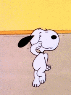 Peanuts gif. Snoopy dances a jig, waving his arms across his face, dipping back, and shifting from leg to leg.