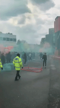 Premier League Match Postponed as Anti-Glazer Protesters Take to Pitch at Manchester United's Home Ground

