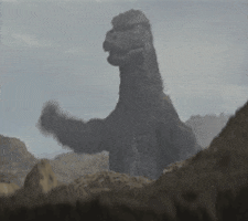 godzilla brush shoulders GIF