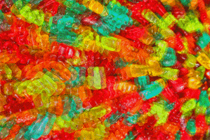 sliding gummy bears GIF
