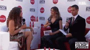 red carpet put your feet up GIF by AMAs