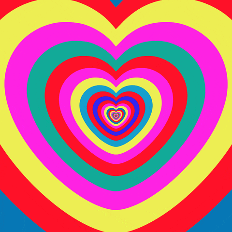 Digital art gif. We zoom in on an dizzying contagion of concentric hearts in red, pink, yellow, blue, and green. 