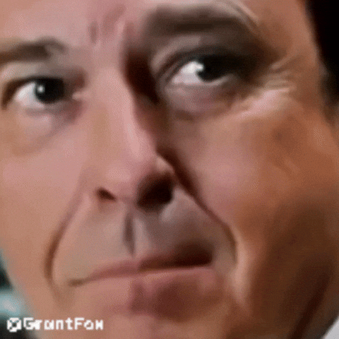 Evil Smile GIF