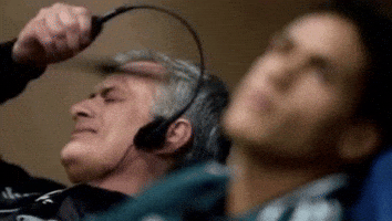 Commentator Headphones Off GIF